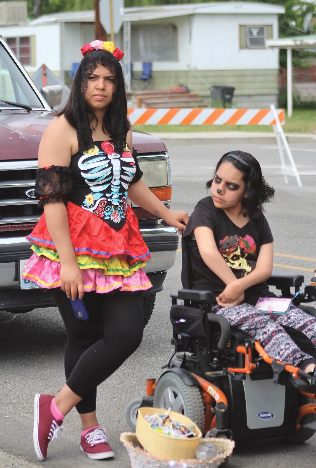 Berenice Gamez, left, and her sister, Maritza Gomez, showed up in costume for the festivities.