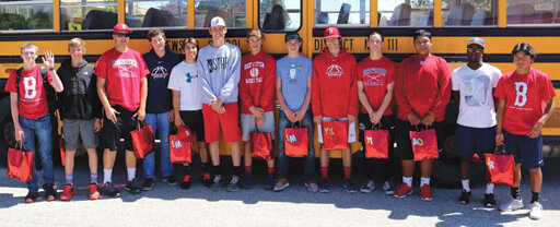 Photo Courtesy of Brewster Sports
The Brewster Bears varsity baseball team poses before boarding the team bus to Ferris High School in Spokane for the first round of state baseball playoffs.