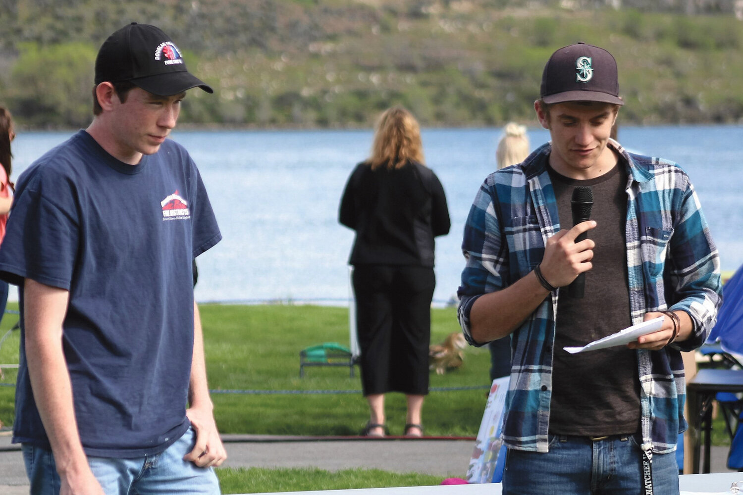 Pateros High School seniors, Austin Yancey, left, and Isaac Wall planted native varieties in the Memorial to the Methow Park as their senior project.