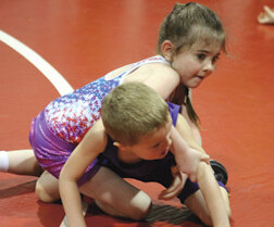 The girls proved that they are not to be taken lightly on the mat as Larissa Elias, 6, or Oroville, put a move on five-year-old Charles Heen of Pateros.