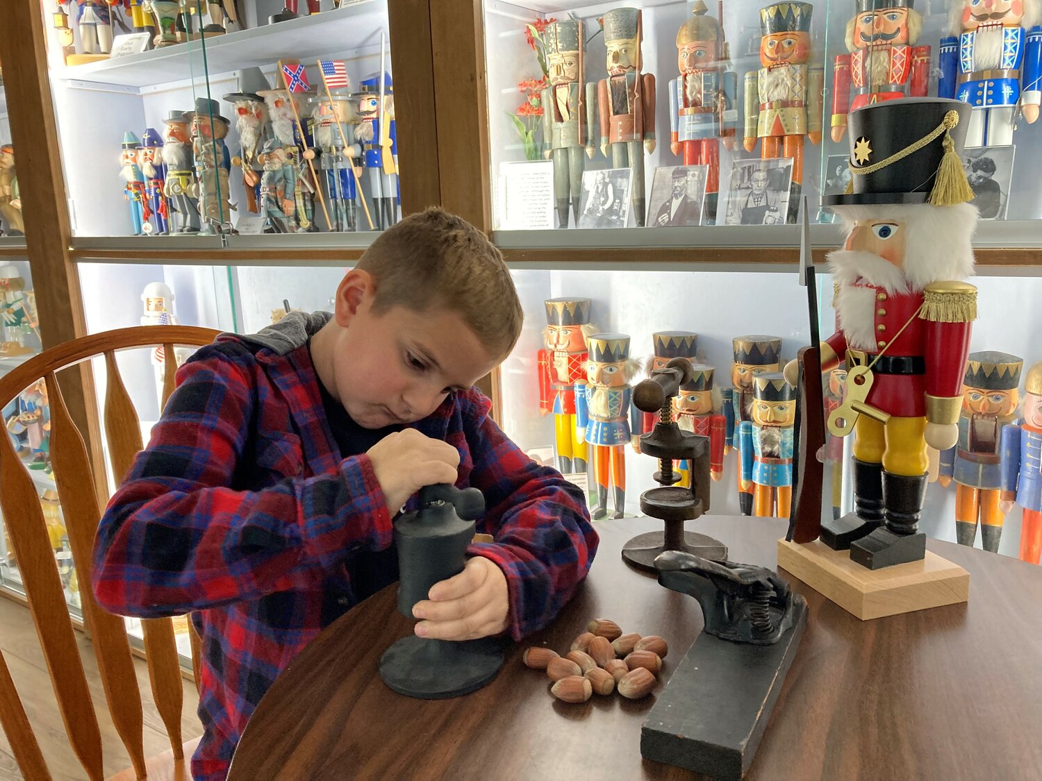 Six-year-old Easton Harper of Marysville enjoys checking out the newest and oldest nutcracker tools every time he comes to visit his grandma in Leavenworth. Easton is fascinated with tools and has a very technical mind already at his young age. He was a joy for visitors to watch.
Photo by Barbara Washburn