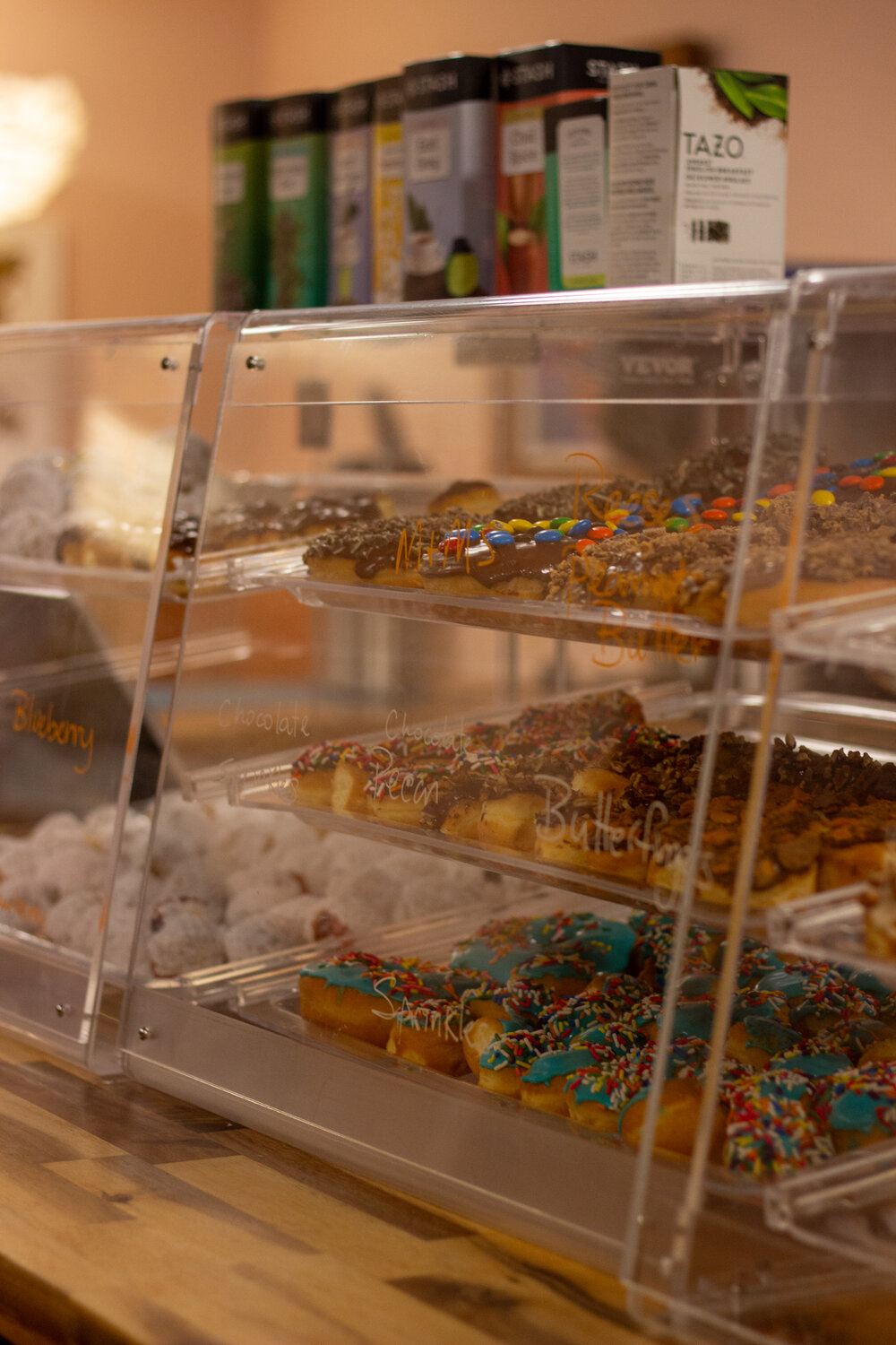 The shop serves mini-doughnuts, doughnut holes, and bars, which span from candy toppings to classic maple or Bavarian cream.
