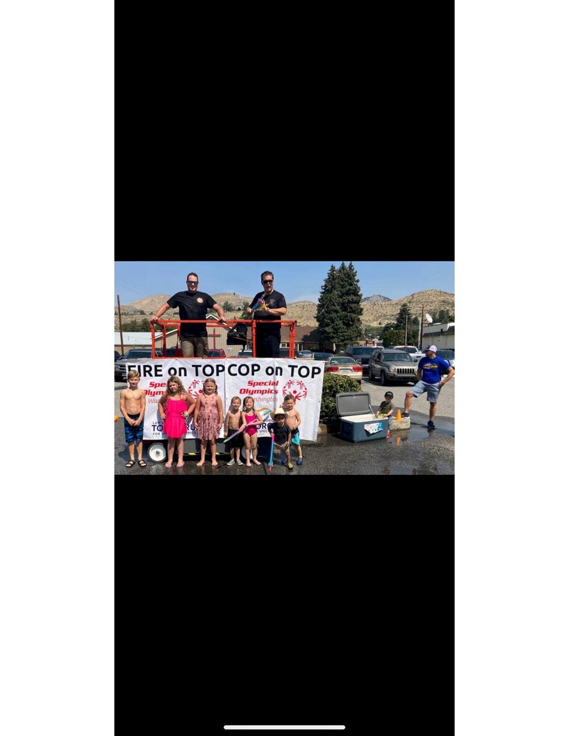 Last summer, children sprayed water at police officers and firefighters as part of a fundraiser for the Chelan Special Olympics.