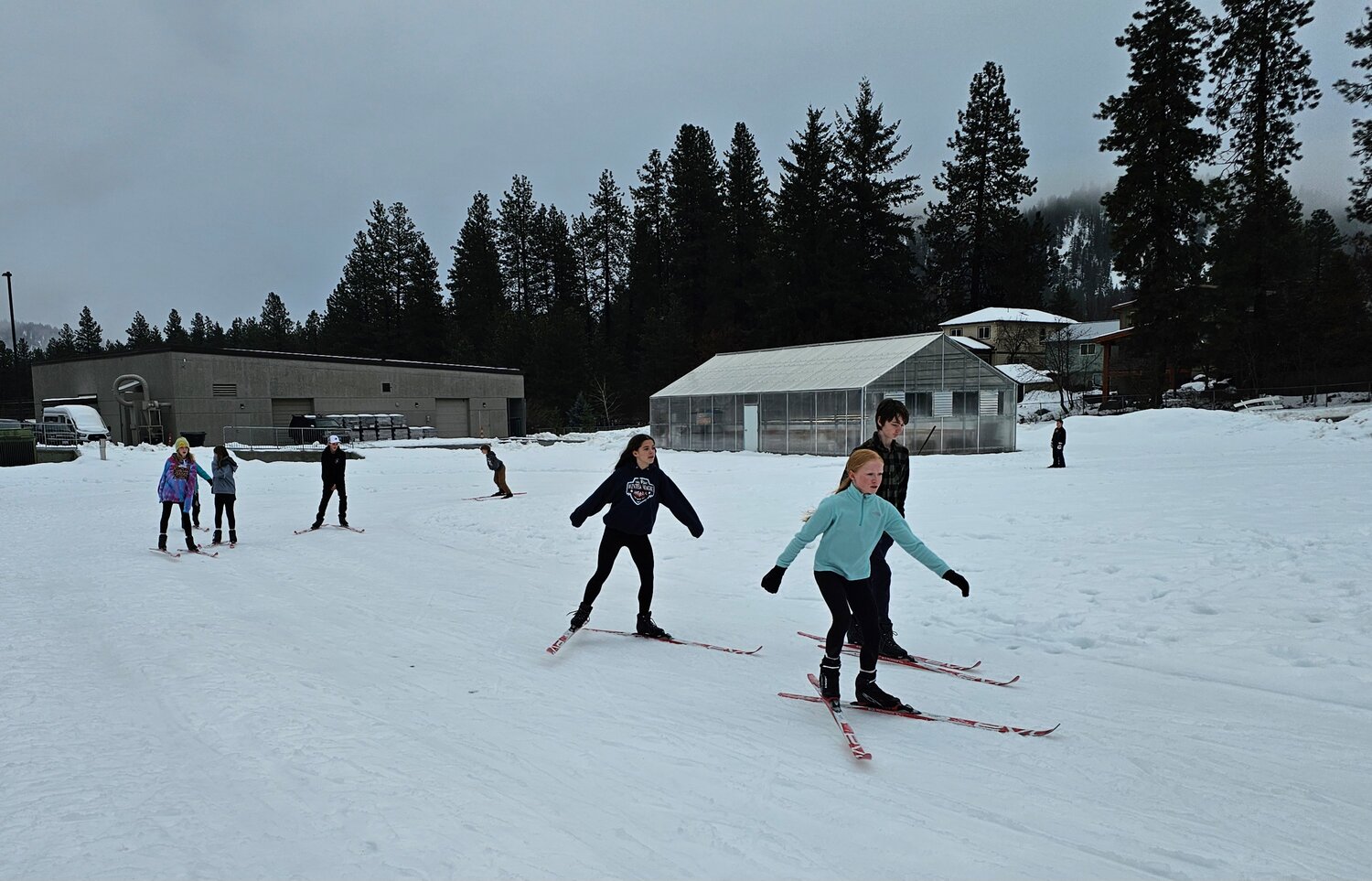 Students ski during their P.E. class on a ski track groomed by Leavenworth Winter Sports Club.