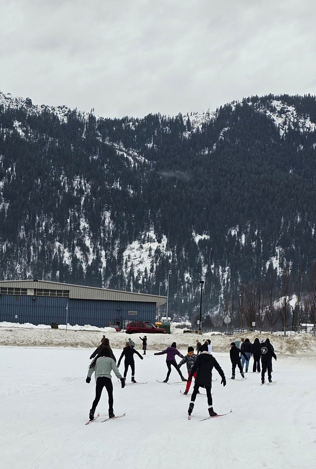 Students ski during their P.E. class on a ski track groomed by Leavenworth Winter Sports Club.