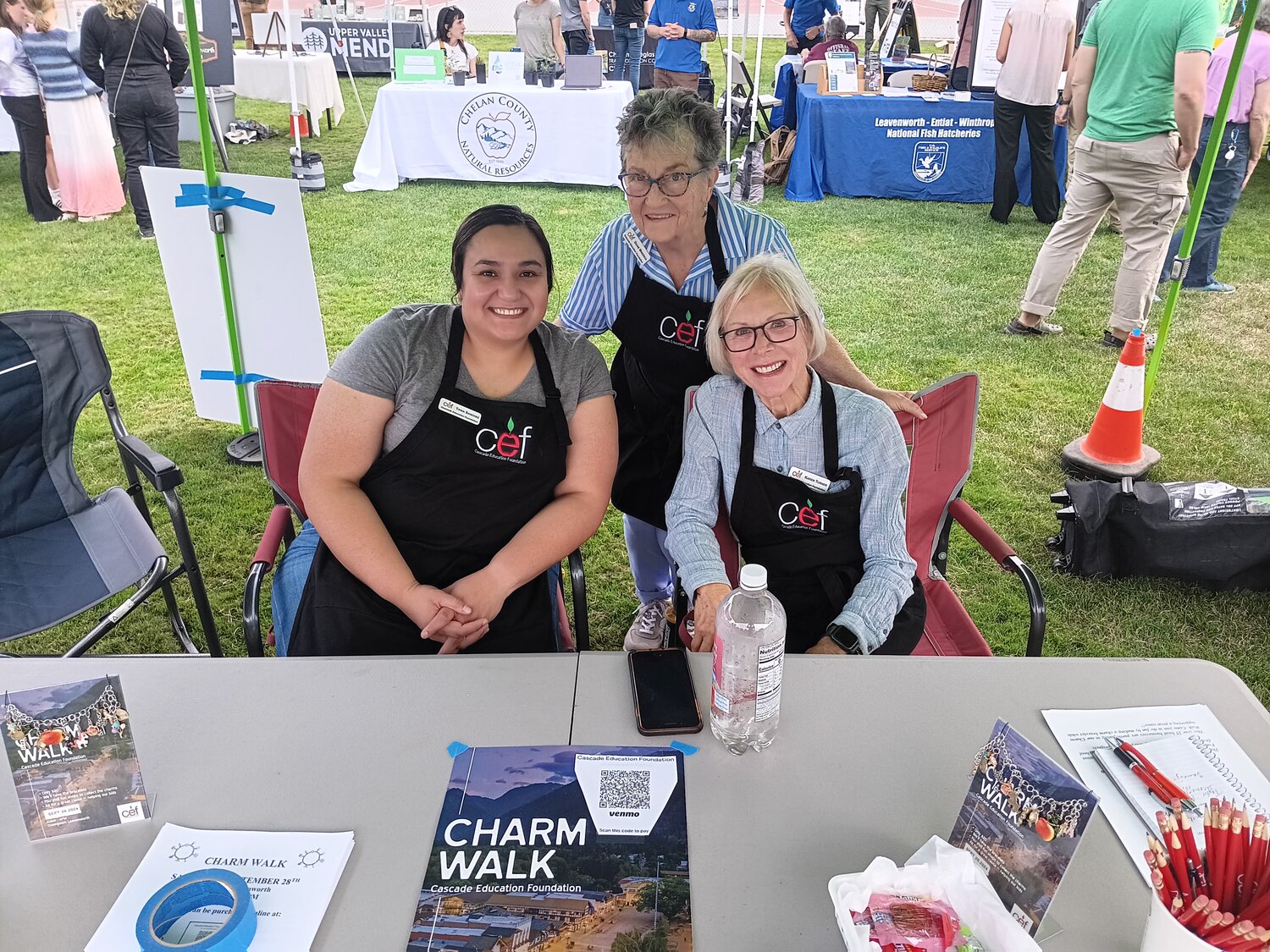 CEF Board Members Tania Sanchez, Diane Minerich, and Karen Turner table at the Community Block Party.