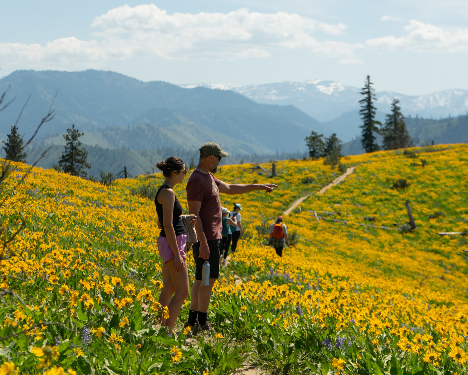 People from all over the state grab their hiking boots, sunglasses and water bottles for this 4-mile in and out hike.