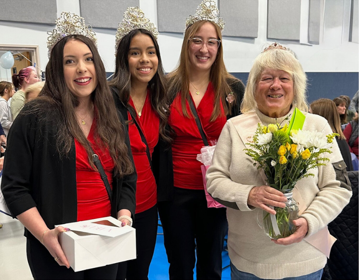 For 27 summers, Viki Downey dedicated her talents to the Manson Bay Park, retiring earlier this year. She is pictured with 2025 Manson Apple Blossom royalty, Princess Isabella Alexander, Queen Genesis Torres and Princess Brynn Williams.