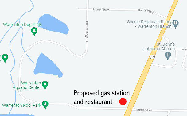 The site of a proposed gas station and restaurant is shown at the corner of South Highway 47 and Warrior Avenue. The mixed-use facility would include gas pumps, convenience store, fast food with drive-thru, and also a drive-thru car wash.