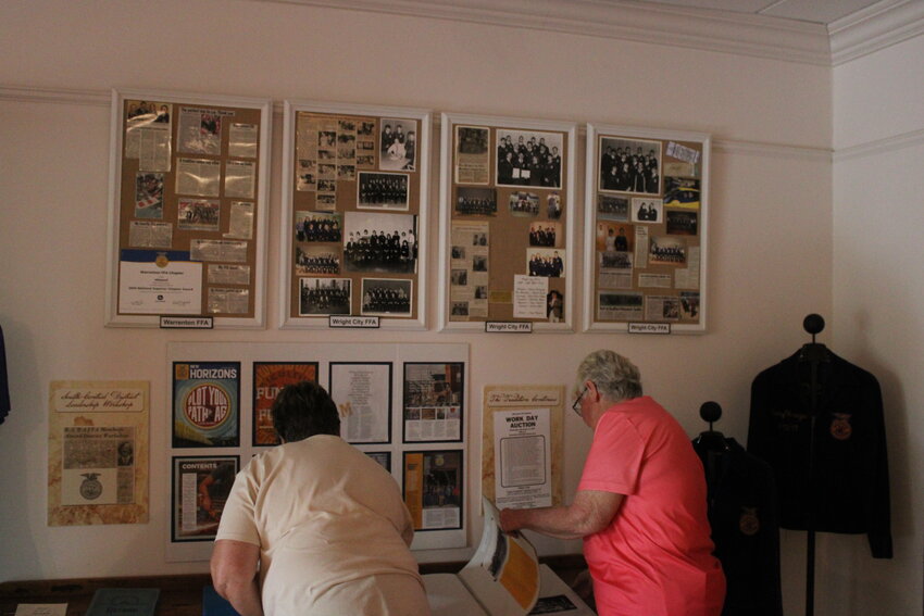 Jackie Nierman and Martha Groeper explore part of the new exhibit at the Warren County Historical Society.