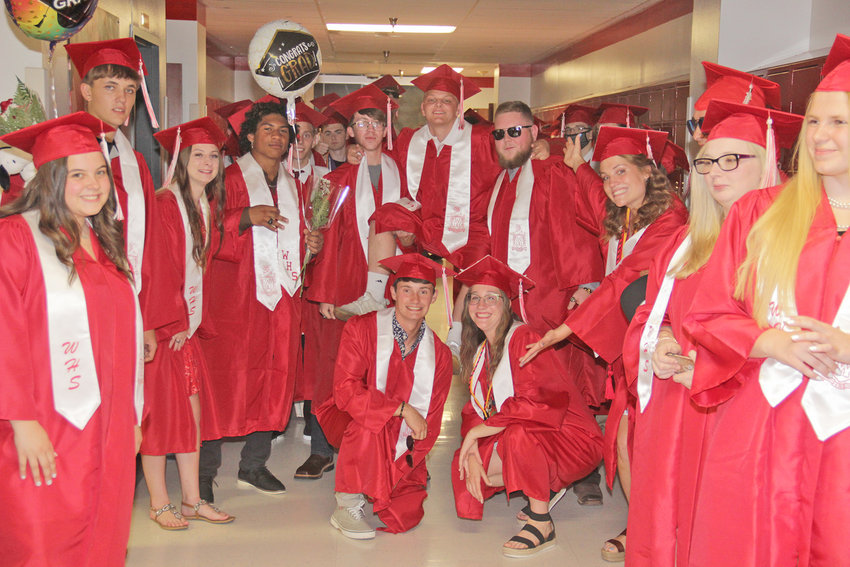 READY TO CELEBRATE &mdash; Seniors took a moment for a fun photo while waiting to begin their graduation ceremony June 12 at Warrenton High School.		Adam Rollins photo.
