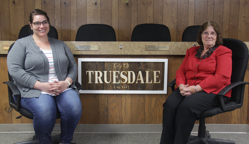 PASSING THE BATON &mdash; MaryLou Rainwater, right, has retired as Truesdale&rsquo;s city clerk and administrator after 39 years in office. Elsa Smith-Fernandez, left, a 10-year employee, has been appointed as the new city clerk.