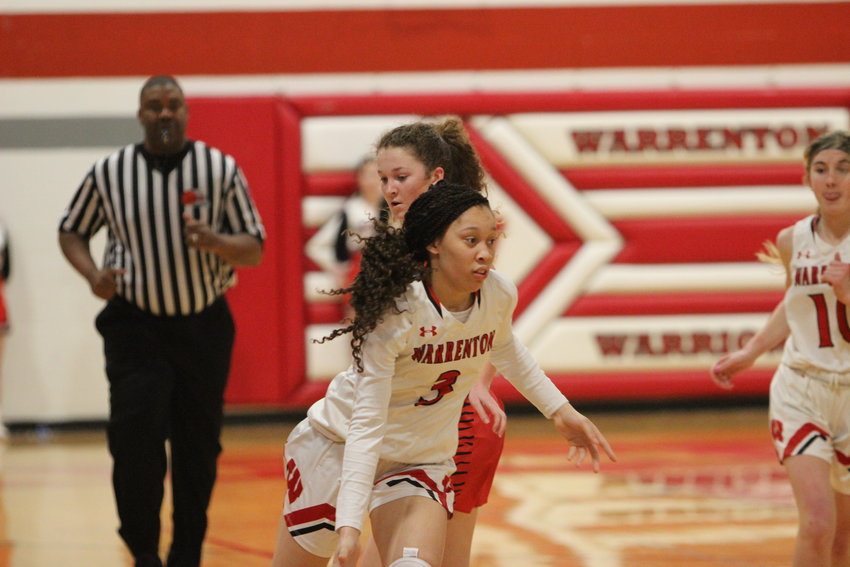 Warrenton senior Garneisha Love drives to the basket during Friday's game against Winfield. Love was named Most Valuable Player of the Washington Tournament earlier this year.