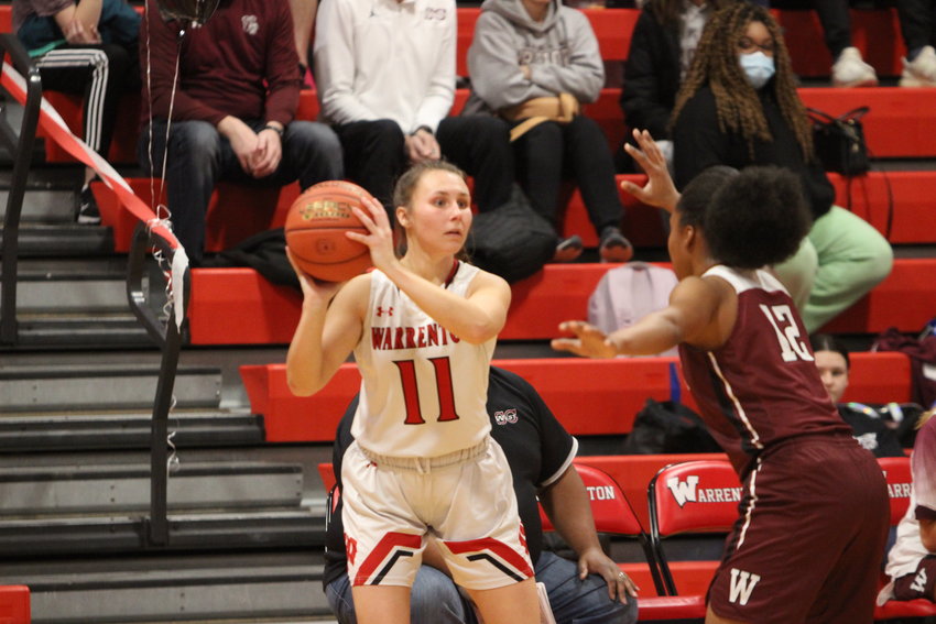 Kaylin Haas looks to pass the ball during a game against St. Charles West last month. Warrenton will square off against St. Dominic High School Friday for the district title.