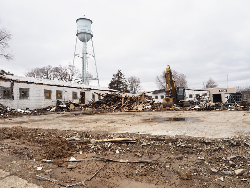PARTIALLY DEMO&rsquo;D &mdash; A demolition contractor is partway through removal of the derelict hat factory in Marthasville. This file photo shows the demolition progress in early March.