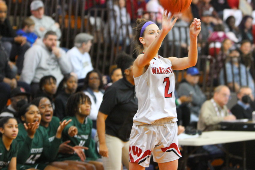 Kendall Taylor attempts a three-point shot during Saturday&rsquo;s state quarterfinal game against Whitfield.