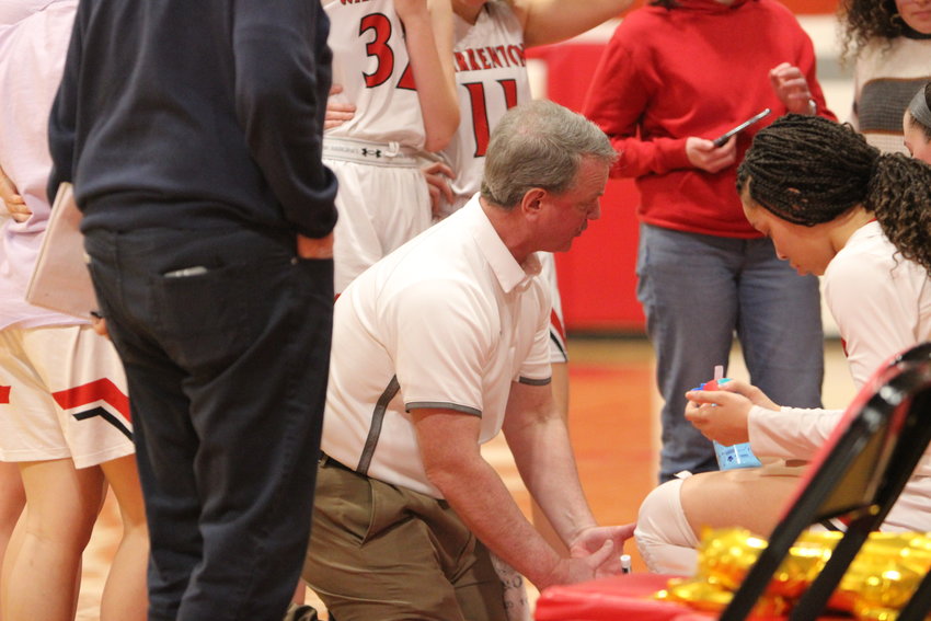 Greg Williams coaches the Warrenton Lady Warriors during a game earlier this season. Williams announced he will not return to coach the Lady Warriors next season.