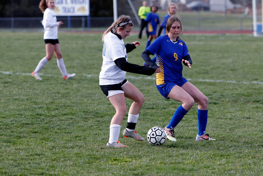 Abigail Unterreiner (right) battles for possession of the ball during last week&rsquo;s loss.