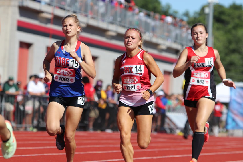 Madelyn Marschel (middle) competes in the 800-meter run at the Missouri state track and field meet Friday.