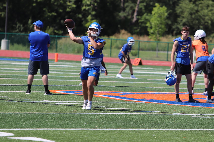 Wright City quarterback Joey Gendron completes a pass at a scrimmage at North Point last week.