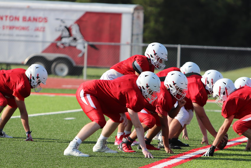 The Warrenton offense prepares to run a play during summer camp. The Warriors and Wildcats will both compete at a Jamboree Friday.