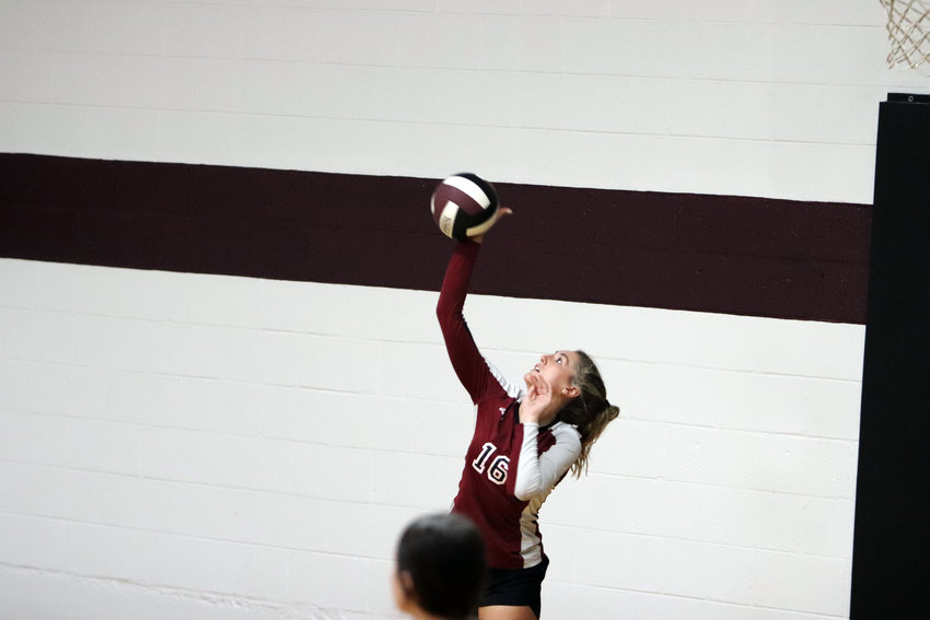 Kylee Ball hits a serve during Liberty Christian&rsquo;s win over Christian Academy of Greater St. Louis. Liberty Christian won the match in three sets.