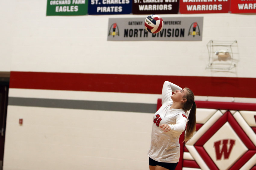 Harley Taylor hits a serve during Warrenton&rsquo;s win over St. Charles West.