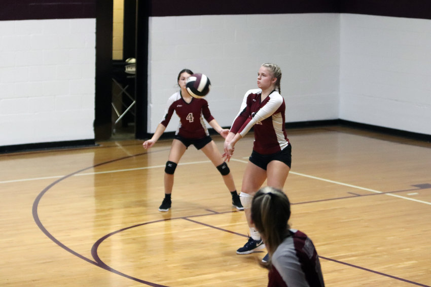 Alli Meyer (middle) prepares to pass the ball during Tuesday&rsquo;s win over Eagle Ridge Christian.