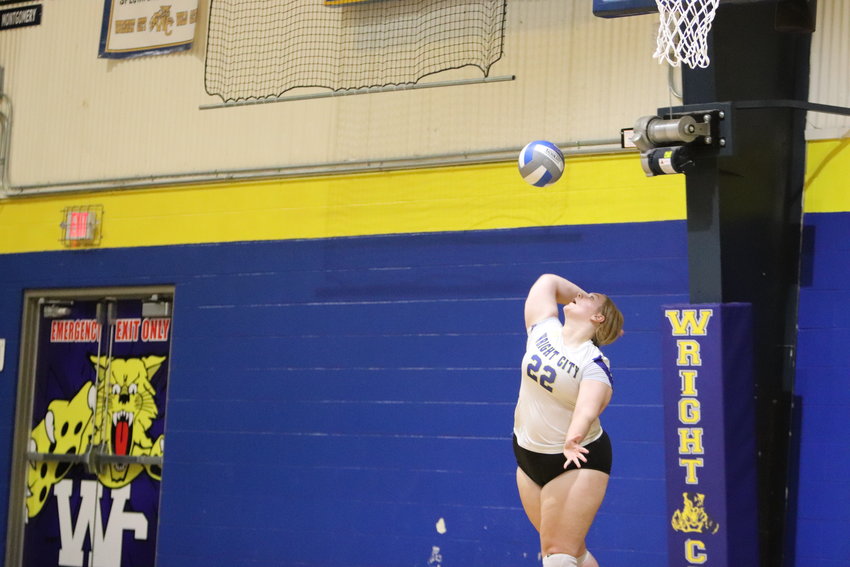 Alexei Gatewood hits a serve during Monday&rsquo;s loss to St. Charles West.