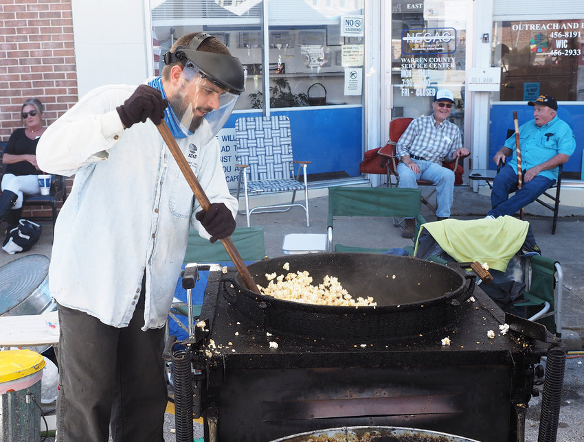 KETTLE CORN POPPING &mdash; A team from Old Fashioned Kettle Corn was just one of the food vendors on Main Street in Warrenton during the 2022 event.