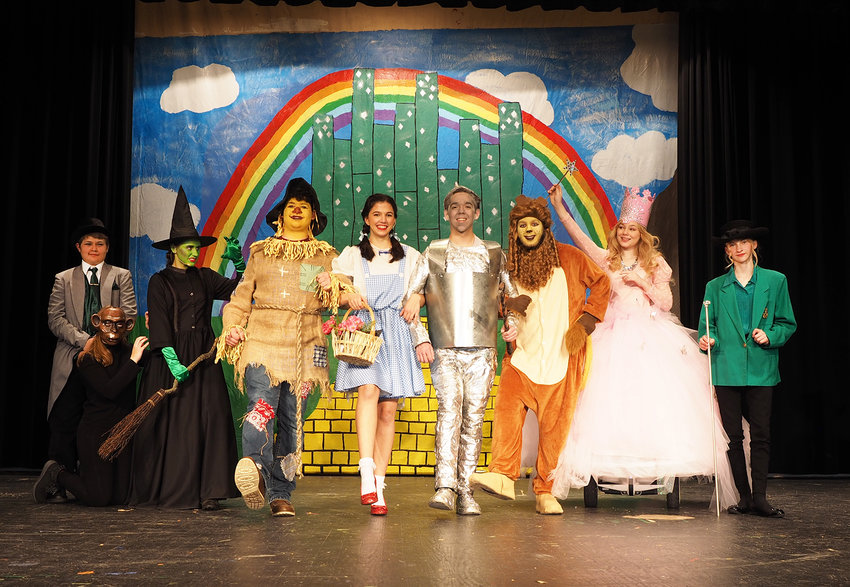 FOLLOW THE YELLOW BRICK ROAD &mdash; Warrenton High School Theater will present &ldquo;The Wizard of Oz&rdquo; Thursday through Saturday, Nov. 10-12, at 7 p.m. each evening. Pictured, from left, are Joe Spencer (Wizard of Oz), Charlotte Sibert (Flying Monkey), Becca Spencer (Wicked Witch), Owen Flores (Scarecrow), Alexandra Chandler (Dorothy), Julian Miller (Tin Man), Noah Agler (Cowardly Lion), Becca Spencer (Glinda), and Natalie Scheibe.