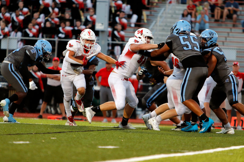 Warrenton sophomore Austin Haas carries the ball during a home game against St. Charles earlier this season. Haas was named to the GAC North first team at running back.