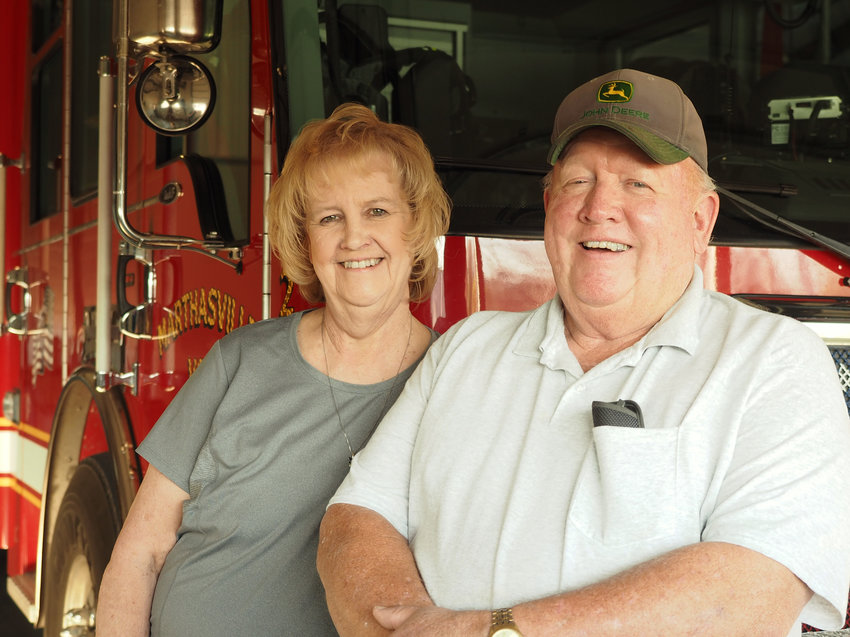 50 YEARS STRONG &mdash; Retired Fire Chief Jim Buescher and his wife Cindy are a unique couple, both serving the public in their roles as first responders. Jim Buescher recently celebrated 50 years with the Marthasville Fire Protection District (MFPD). He was honored by firefighters past and present during a celebration held Wednesday, Nov. 9 at Marthasville&rsquo;s Station 1. Buescher continues to respond to calls with the MFPD and serves on the district Board of Directors.