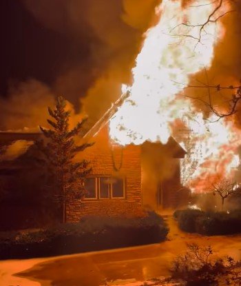 This image, taken from a video shared by Warrenton Fire Protection District, shows the state of a house fire in Innsbrook as firefighters arrived on scene.