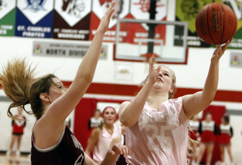 Sophi Mueller attempts a layup during the first half of Friday night&rsquo;s GAC North win over St. Charles West.