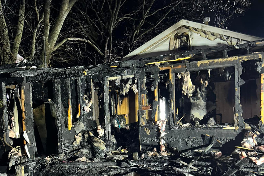 HOUSE FIRE &mdash; A fire destroyed the interior of a home in Truesdale Jan. 19. Neighbors worked together to rescue a woman trapped in the house.