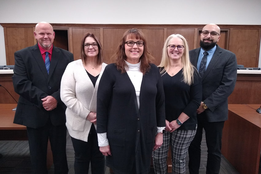 NEW ALDERMAN &mdash; Kim Arbuthnot, center, was appointed Jan. 26 to fill a vacancy on the Wright City Board of Aldermen. She is running unopposed for election to a full, two-year term. Pictured with her, from left, are Aldermen Don Andrews and Karey Owens, Mayor Michelle Heiliger, and Alderman Ramiz Hakim.