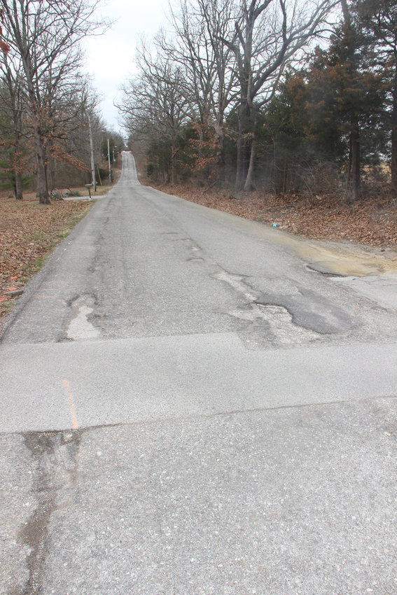 MESSY ROAD &mdash; Ruts and potholes all along Indian Head Lodge Road in Wright City are giving residents a rough ride and causing concerns that the road is going to completely fall apart. There is no active plan to fix the road because city and county governments have both denied owning the road.