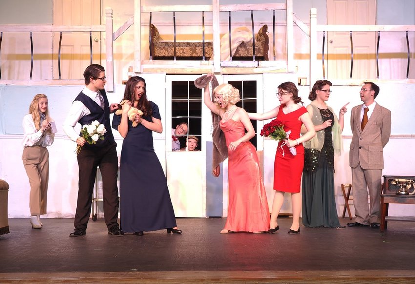 BATTLE OF THE DIVAS &mdash; Warrenton High School&rsquo;s spring play will kick off Thursday, April 13 and continue through Saturday, April 15. &ldquo;Suite Surrender&rdquo; is full of comedic feuding between two USO performers who have been accidentally assigned to share the same suite at a glamorous hotel. The divas stir up everyone, their secretaries, area reporters, the hotel manager and staff. The production includes romance, mistaken identity, good old cat fights and a surprise ending. Pictured, from left, are Natalie Schiebe (Dora del Rio, gossip columnist); Rylan Arndt (Mr. Pippet, Claudia&rsquo;s personal secretary); Alexandra Chandler (Claudia McFadden, matron of song); Mason Rushing (Otis, a bellhop); Conner Patterson (Francis, a bellhop); Danielle Perry (Athena Sinclair, star of screen and stage); Dayne Logan (Murphy Stevens, Athena&rsquo;s personal secretary); Alex Briggs (Mrs. Everett Osgood (society matron); and Noah Agler (Bernard S. Dunlap, general manager of the Palm Beach Royale Hotel).