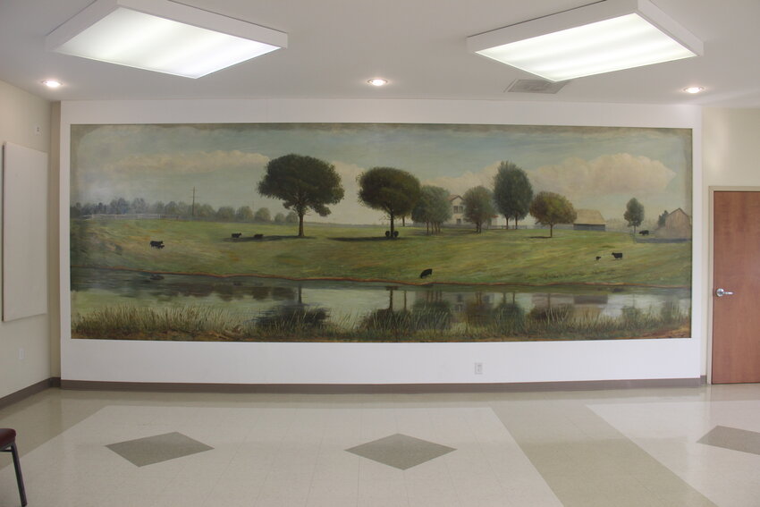 HISTORICAL MURAL &mdash; The large mural housed at the Heiliger Building in Diekroeger Park, painted in 1963 by Estelle Creighton, depicts a scenic view of the Chaney family farm in Wright City. The mural was the focal point of the dining room in Big Boy&rsquo;s Restaurant, the town&rsquo;s most famous business.