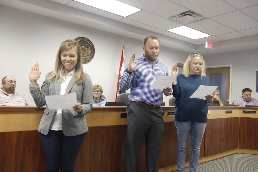 Beth Dean, Kyle Lewis, and Heidi Box Halleman are sworn in to the Wright City R-II School Board after being elected April 4.