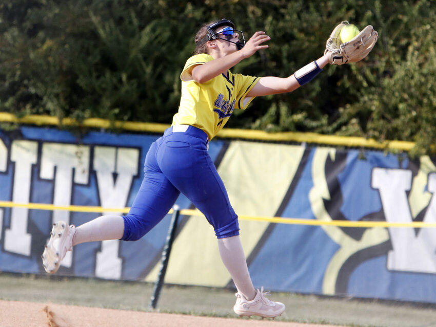 Shortstop Lydia Clubb makes an over the shoulder catch during Wright City's loss to Bowling Green.