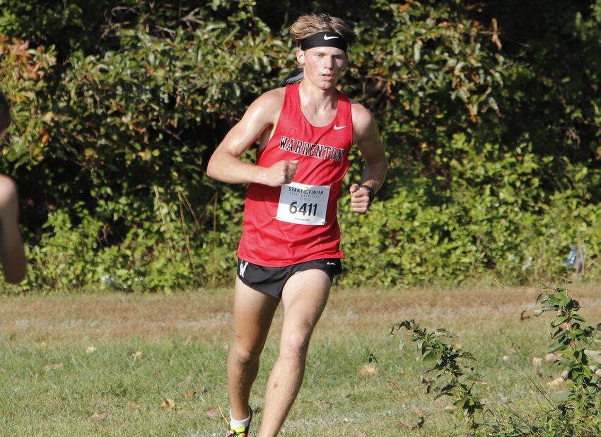 Phillip Kackley runs during the Mike Spoede Invitational Sept. 29 at Warrenton High School. Kackley won the race by eight seconds.