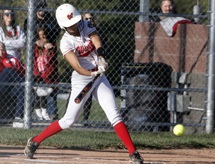 Maddisyn Hoelscher swings at a pitch during Warrenton's 10-0 win over Orchard Farm.
