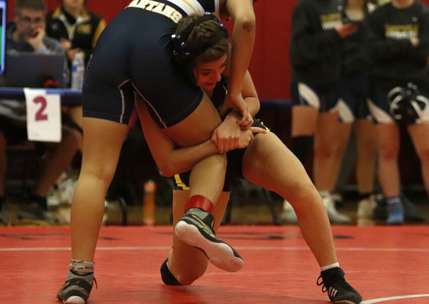 Wright City wrestler Hailey Henson (right) wrestles against Reagynn Childs of Battle High School during the Liberty Invitational last week. Henson won the match and placed second in the 115-pound weight class.