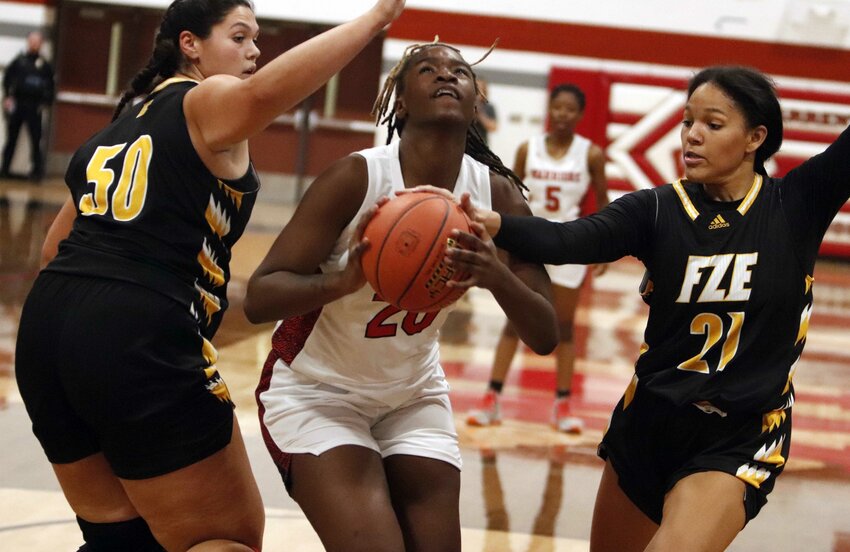Nevaeh Hill drives to the basket during a game against Ft. Zumwalt East.