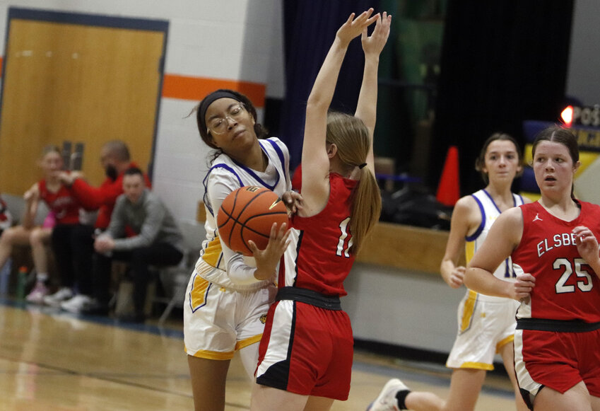 Danika Graham (left) attempts to get past the Elsberry defense during Tuesday night's game.
