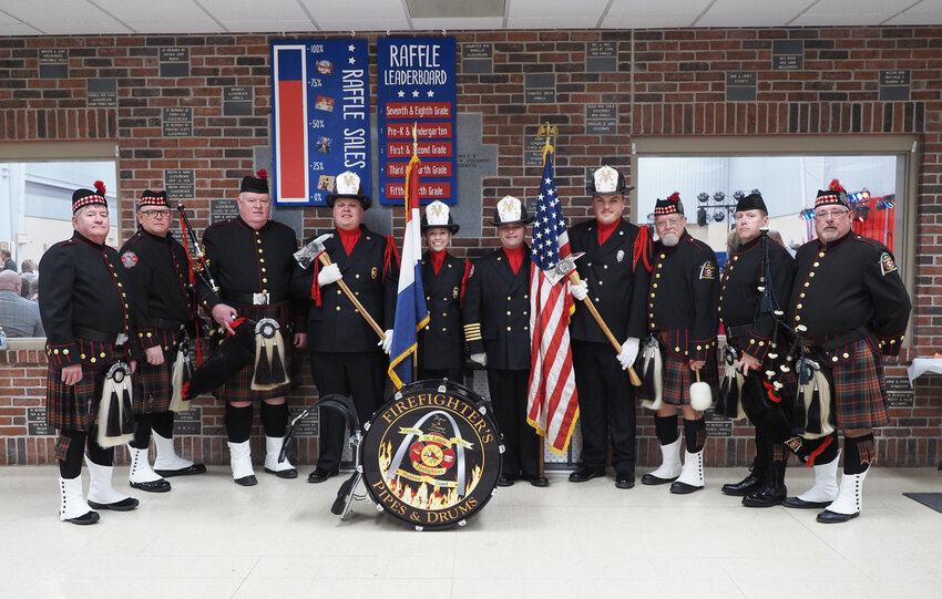 Members of the Marthasville Fire Protection District Honor Guard (center) and the Greater St. Louis Area Firefighters Highland Guard opened the program Saturday, Feb. 17, for the 12th Annual Warren County BackStoppers fundraiser.