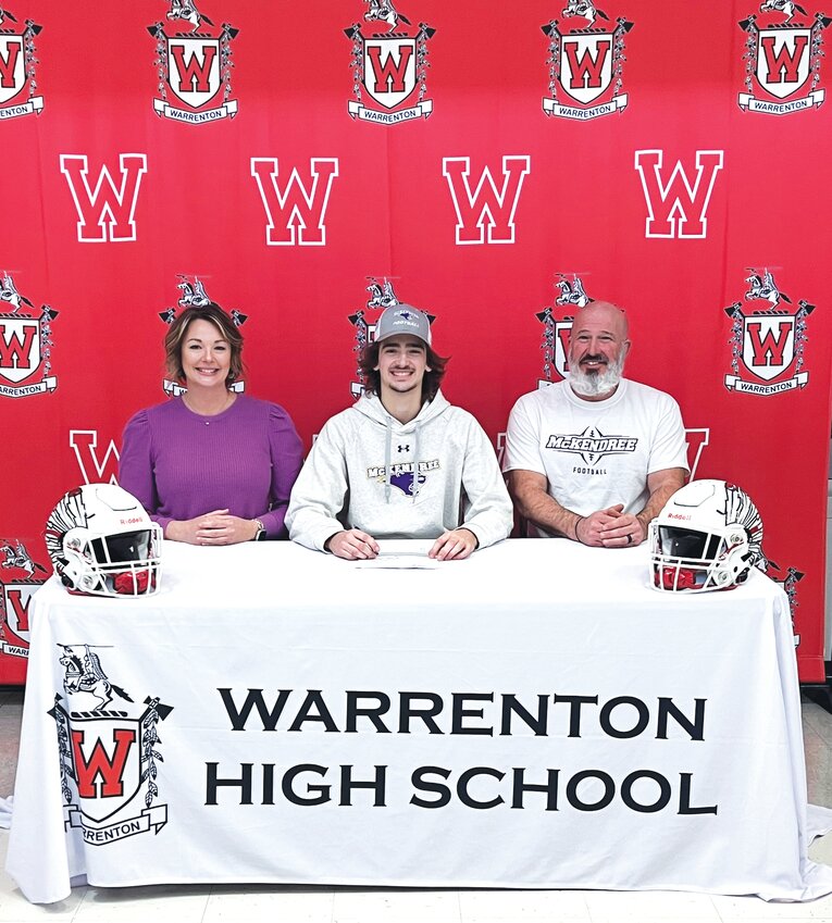 Warrenton senior Charlie Blondin recently signed a letter of intent to play football at McKendree University in Lebanon, Ill. Blondin set numerous school records in his time leading the Warriors at quarterback. Pictured with Blondin are his parents, Stacey and Chad Blondin.