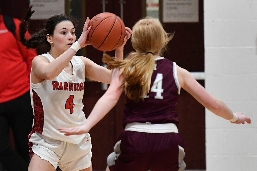 Warrenton's Zoe Duncan looks to make a pass against St. Charles West.